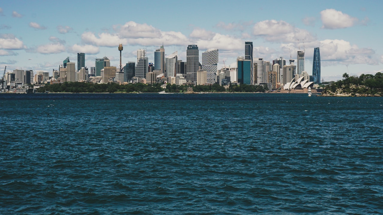 a city skyline across the water