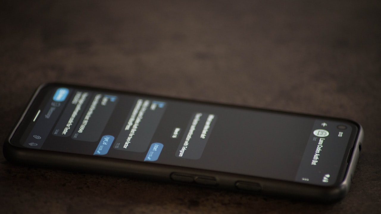 a close up of a cell phone on a table