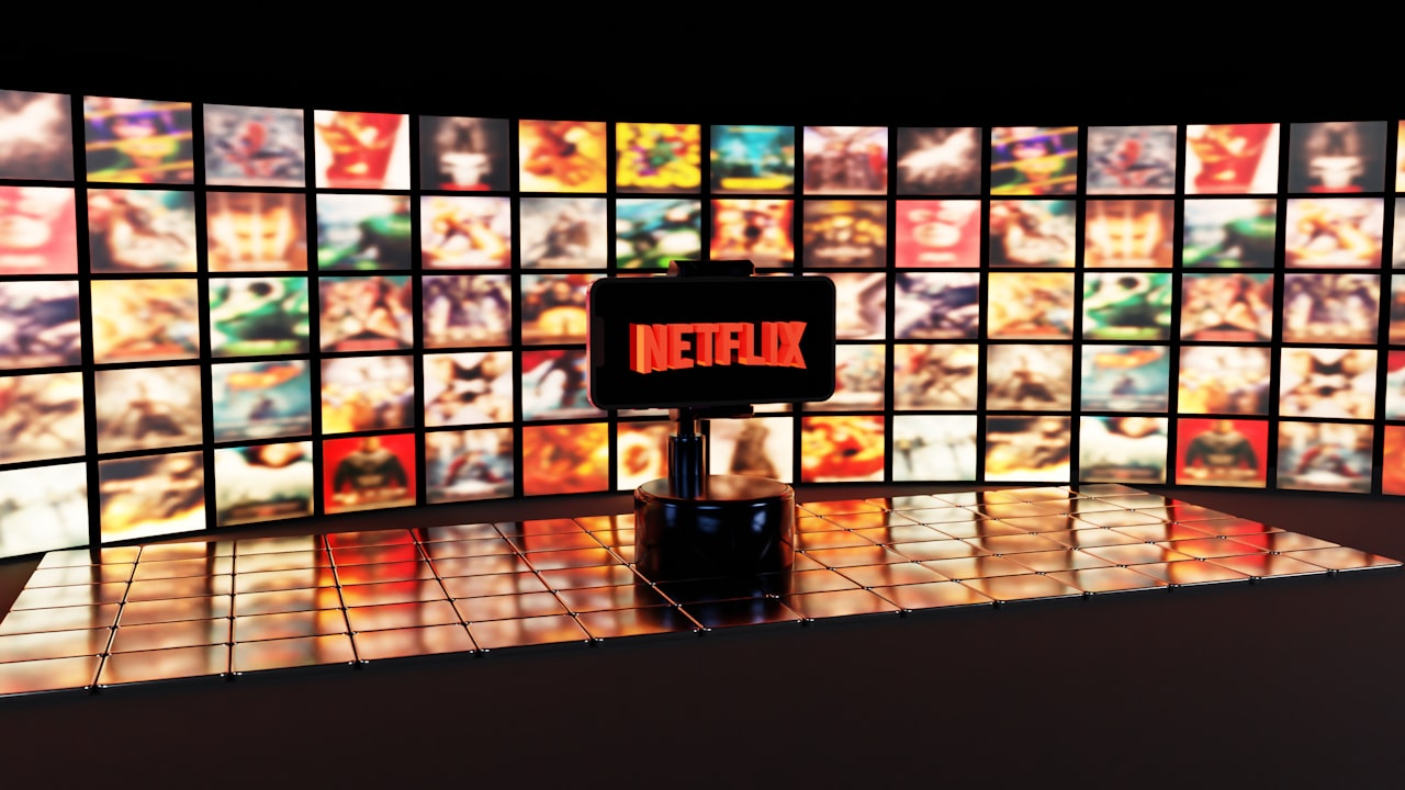 Netflix logo displayed on a wall of movie posters