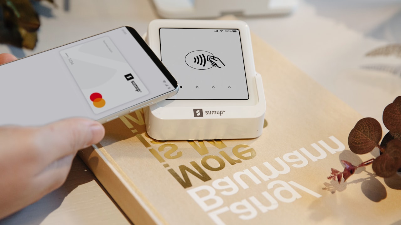 A phone is used for contactless payment.