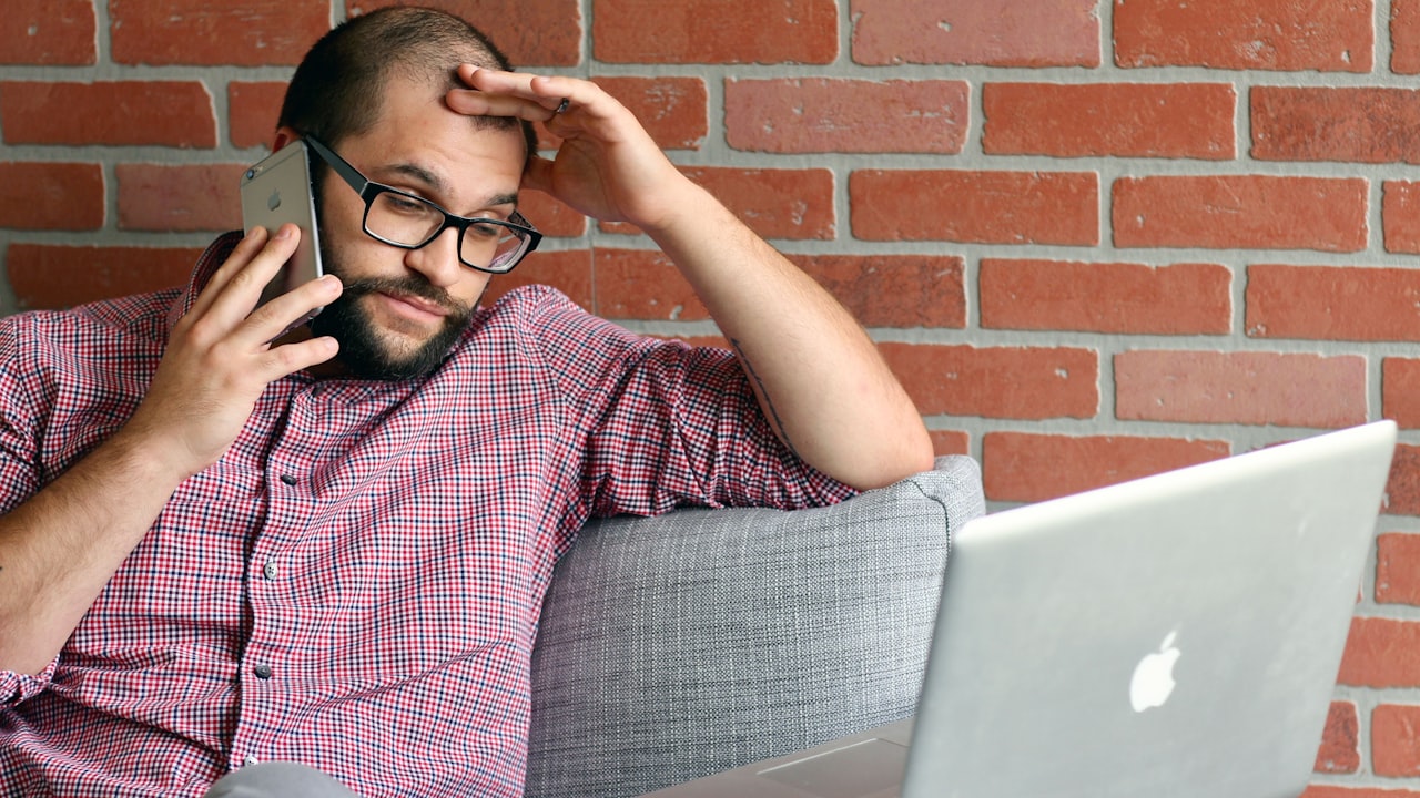 a man with a laptop
